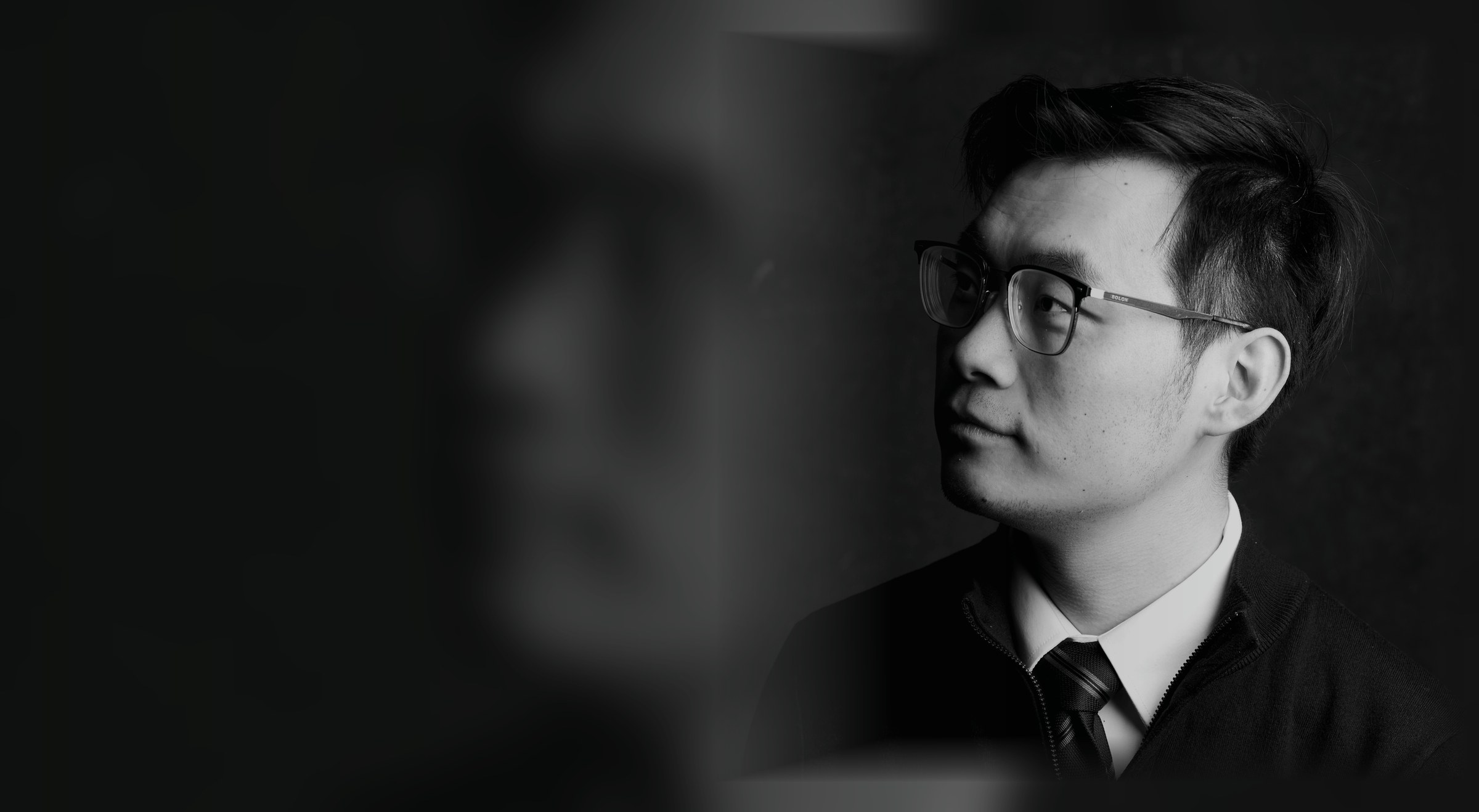 Black-and-white portrait of Virtus Liu